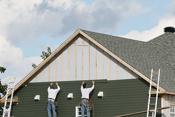 Professional Siding Contractor technician working in Riverdale, NJ